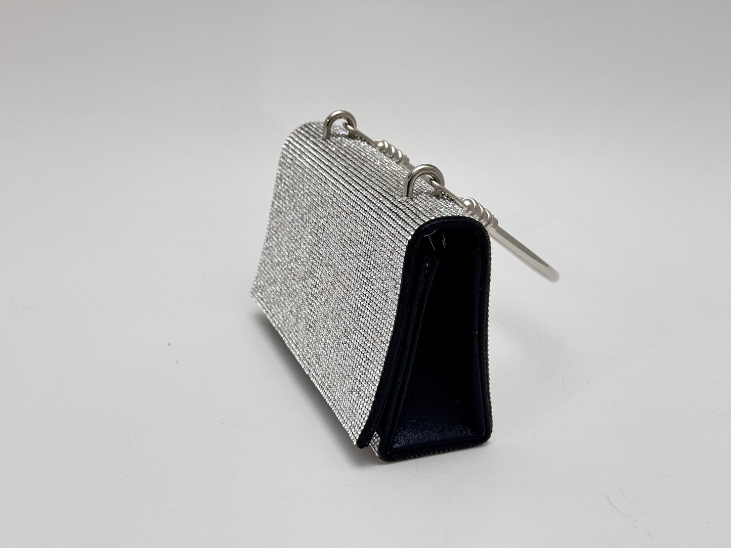 EYE SPARKING CLUTCH BAG